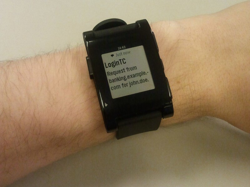 Pebble smartwatch showing a LoginTC notification