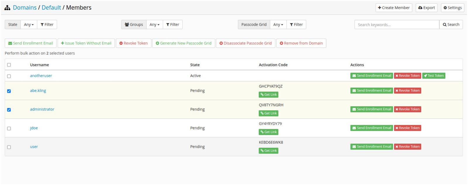 LoginTC Domain Members page with two users selected and a row of bulk action buttons including Generate New Passcode Grid and Disassociate Passcode Grid